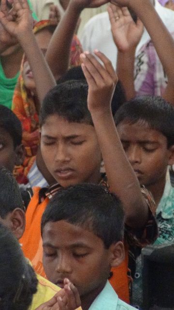 worshipping kids in India